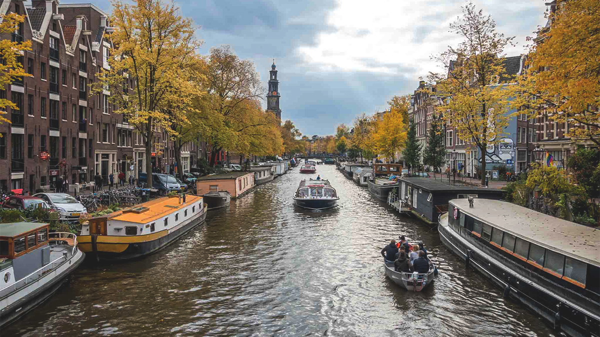 things to do in Amsterdam with kids featured image in canel cruise view