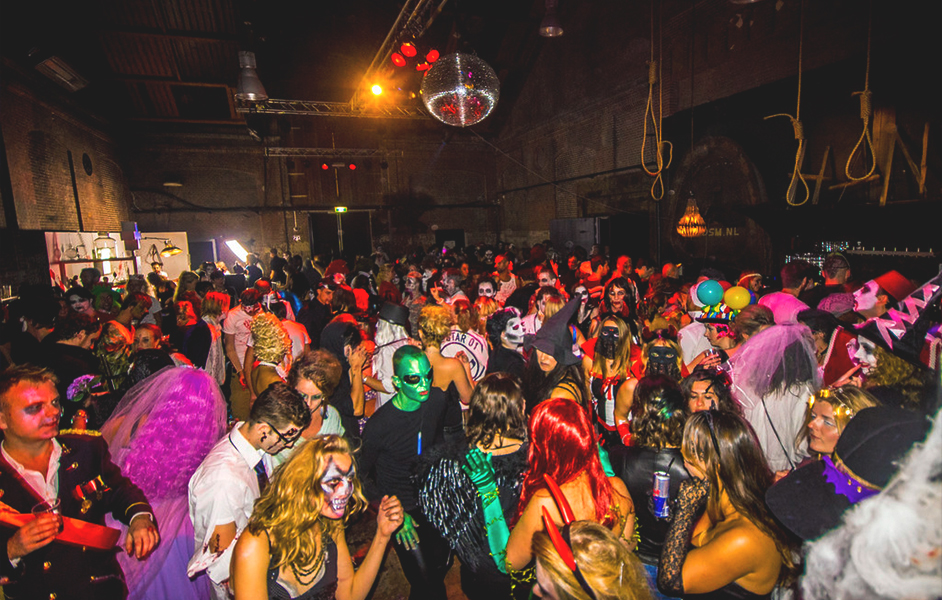 Crowds in costume during the Halloween Parade in Amsterdam