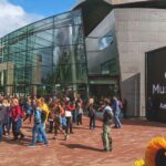 amsterdam van gogh museum tickets with visible entrance and visitors outside, representing ticket access